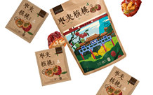 枣夹核桃
##图片标签：红枣, 核桃, 包装设计, 棕色, 绿色, 山水画, 零食